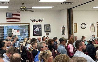 Rogers residents attend Tuesday's Cave Springs City Council meeting.

(NWA Democrat-Gazette/Lydia Fletcher)